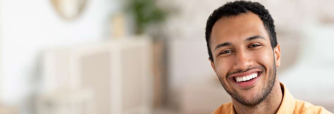 A man smiling after a Dental Implants consultation in Northeast Philadelphia