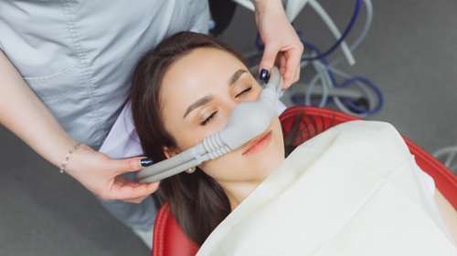 A woman getting Nitrous Oxide in Philadelphia, PA