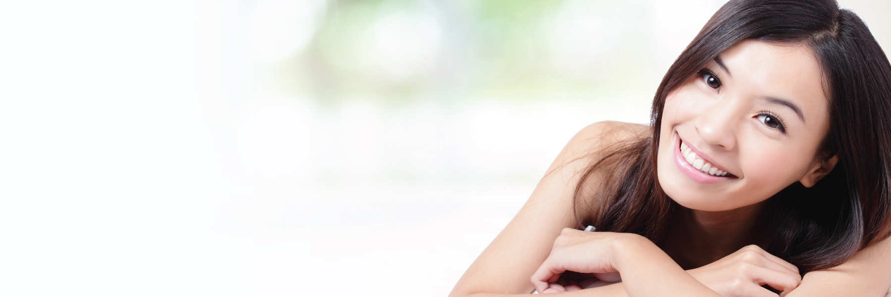 A woman smiling after Overcoming Dental Anxiety With Nitrous Oxide in Philadelphia, PA