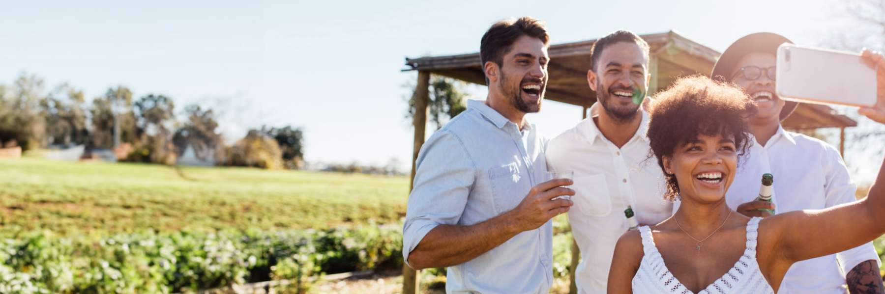 A group of friends smiling after a Porcelain Veneers treatment in Greater Philadelphia Area